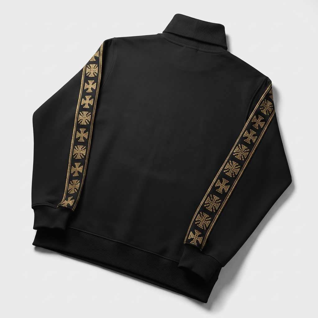 Back view of a black track jacket with gold rhinestone cross tape down the sleeves and a mock neck.