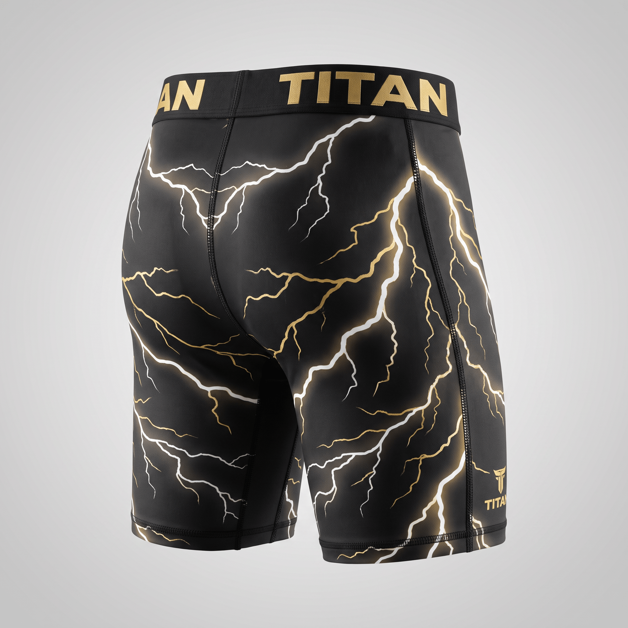 Titan black and gold lightning compression shorts shown from the back, featuring a branded waistband.