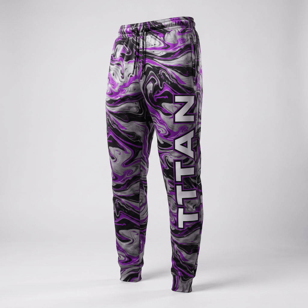Purple, grey, and black marble print joggers with a drawstring waist and vertical Titan logo on the left leg.