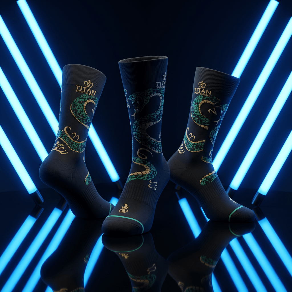 Black athletic socks featuring green snake patterns and gold Titan branding against a background of blue neon lights.