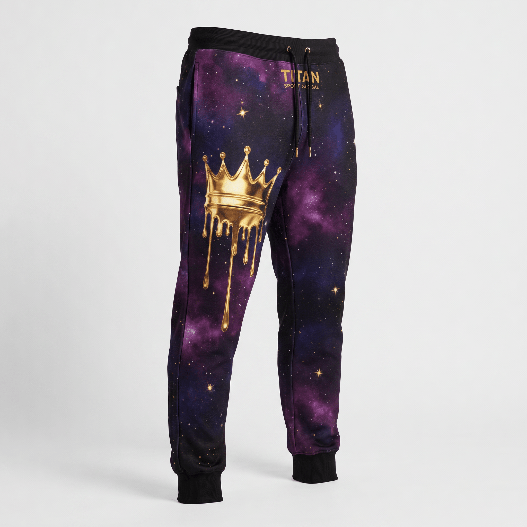 Black joggers featuring a purple galaxy print, gold crown graphic, and Titan Sport Global logo.