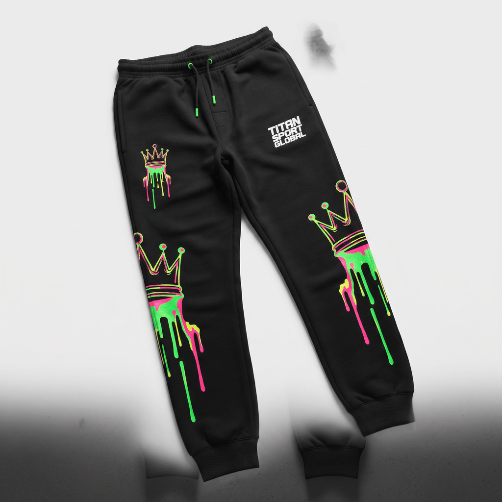 Black sweatpants with neon green and pink dripping crown graphics and Titan Sport Global logo.