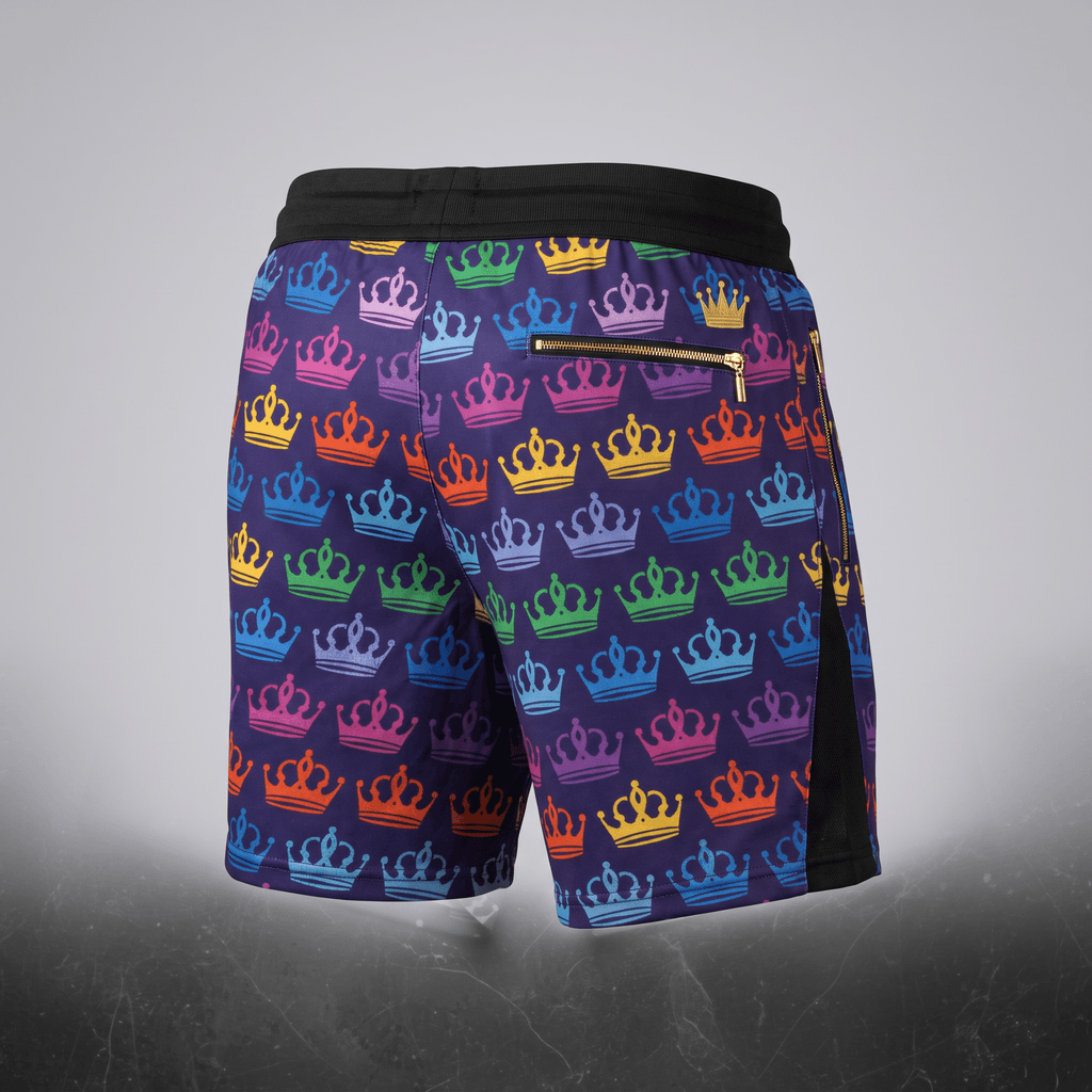 Purple athletic shorts featuring an allover colorful crown pattern, black waistband, and gold zipper pockets.