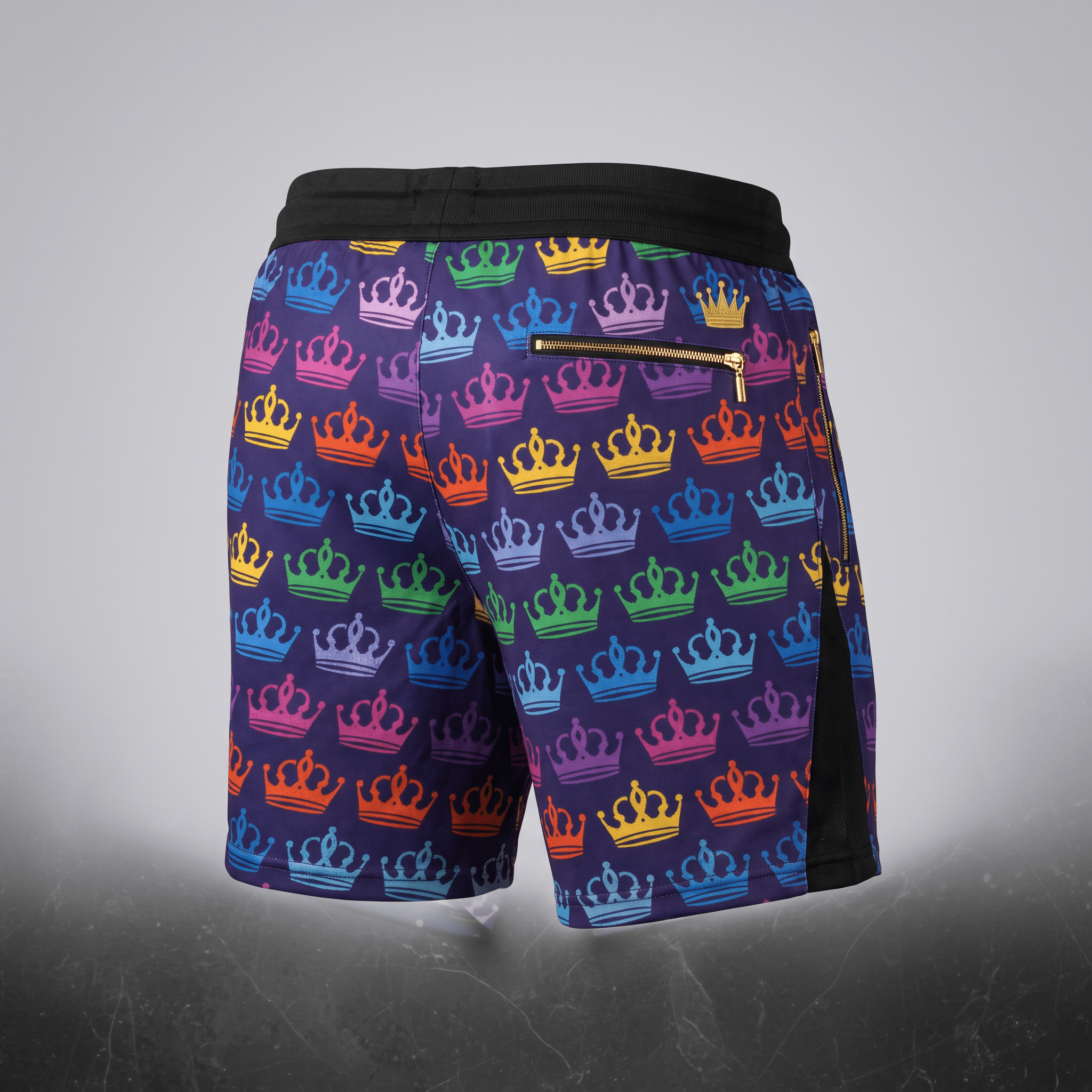 Purple athletic shorts featuring an allover colorful crown pattern, black waistband, and gold zipper pockets.