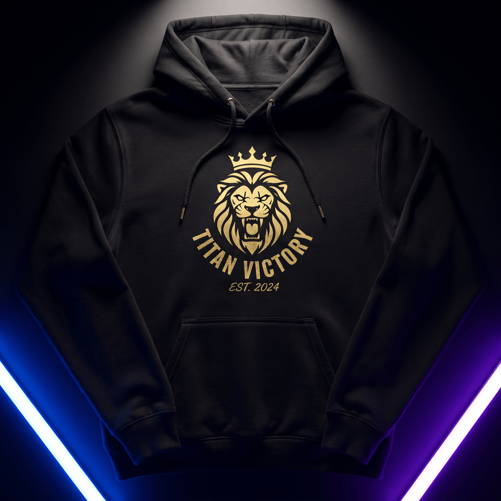 Black hoodie with a gold lion wearing a crown, "Titan Victory Est. 2024" logo, on a black background with neon lights.