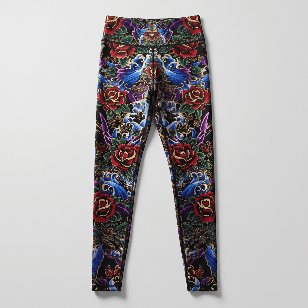Black leggings featuring a vibrant tattoo-style print of red roses, blue waves, and ornate floral patterns.