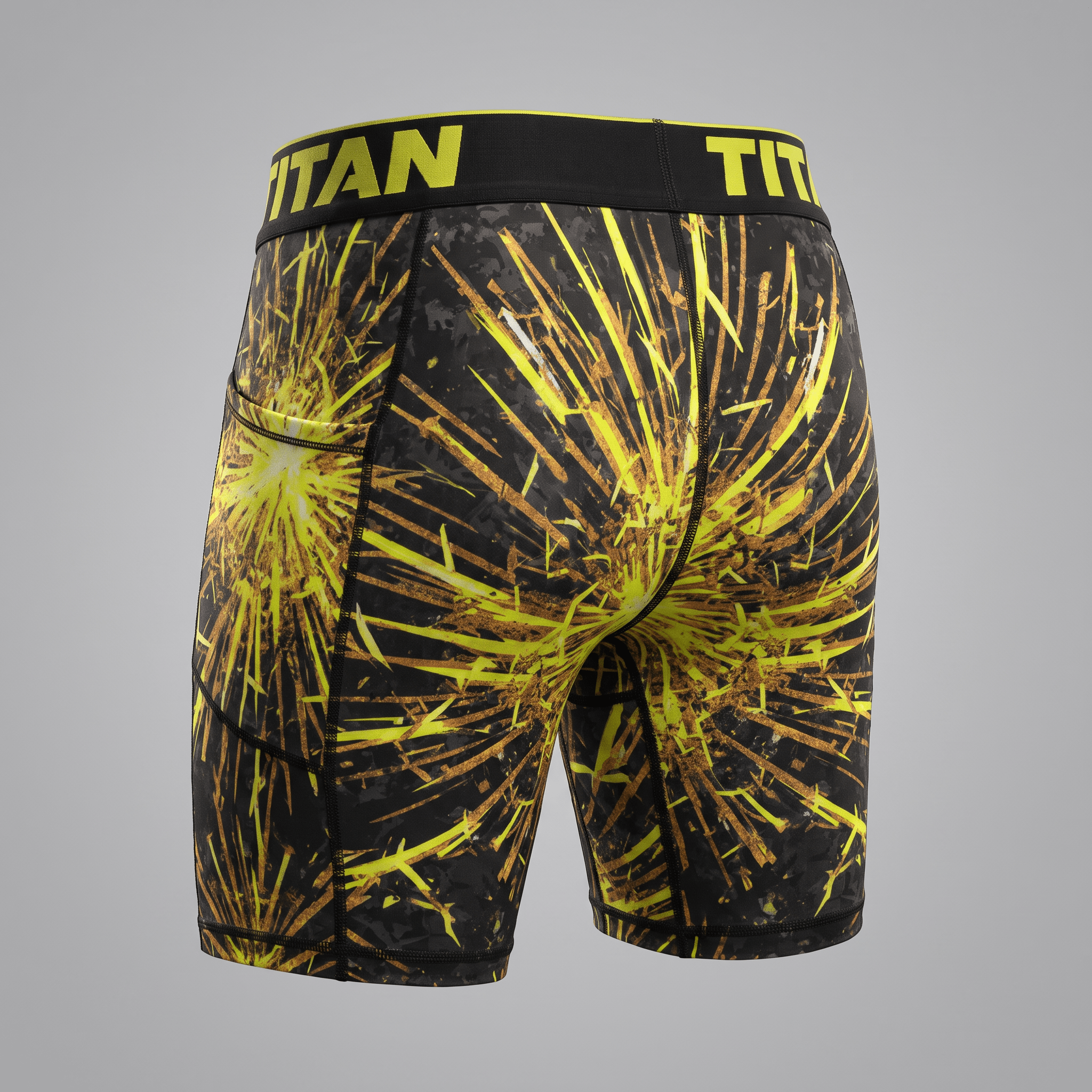 Rear view of Titan compression shorts in black with a yellow firework burst pattern and branded waistband.