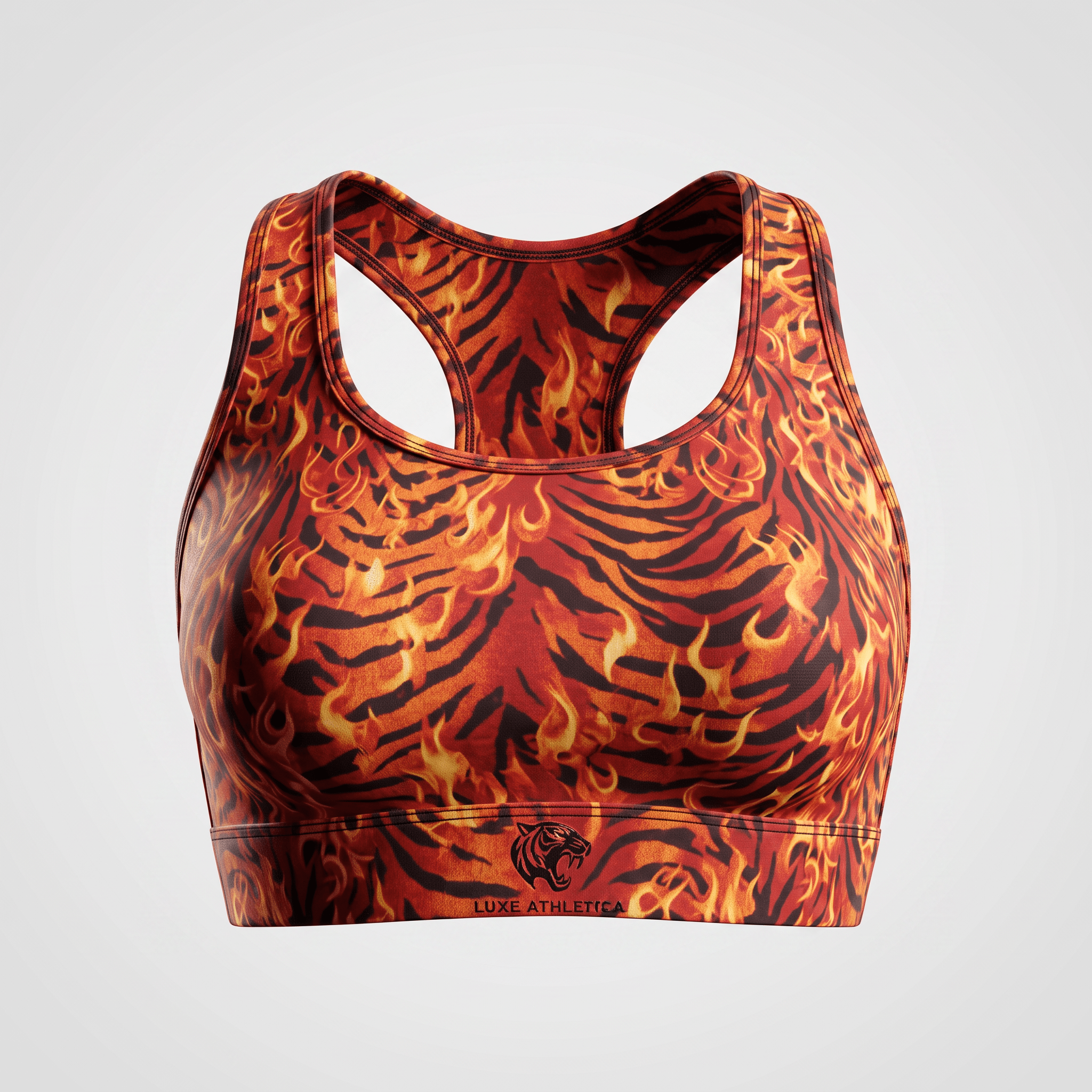 Luxe Athletica racerback sports bra in red, orange, and black tiger flame print.