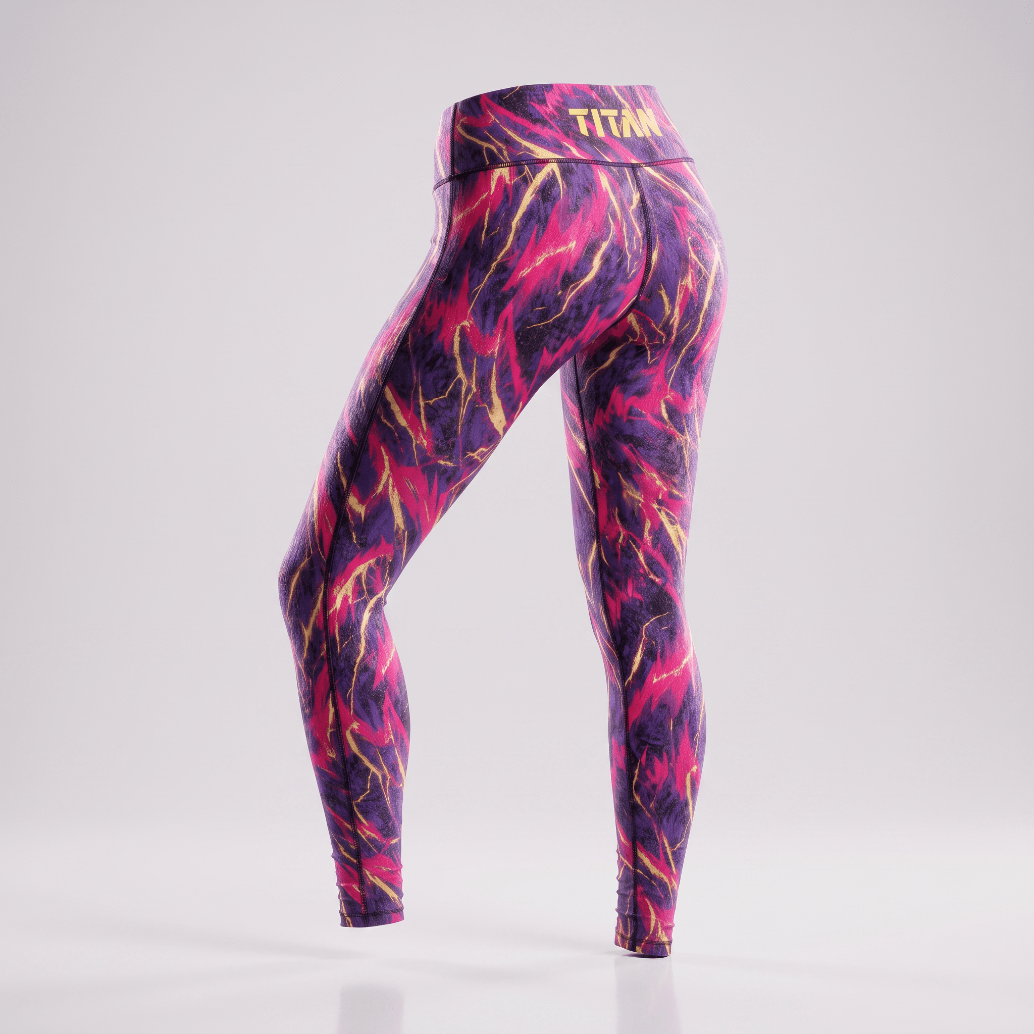 Purple and pink lightning print high waisted leggings with gold Titan logo on back waistband.
