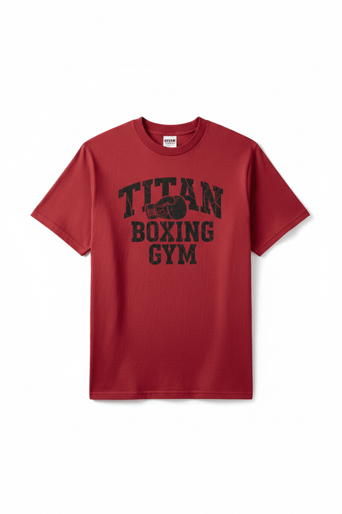 Knockout Red crewneck tee with distressed black "TITAN BOXING GYM" text and vintage glove graphic on the chest.
