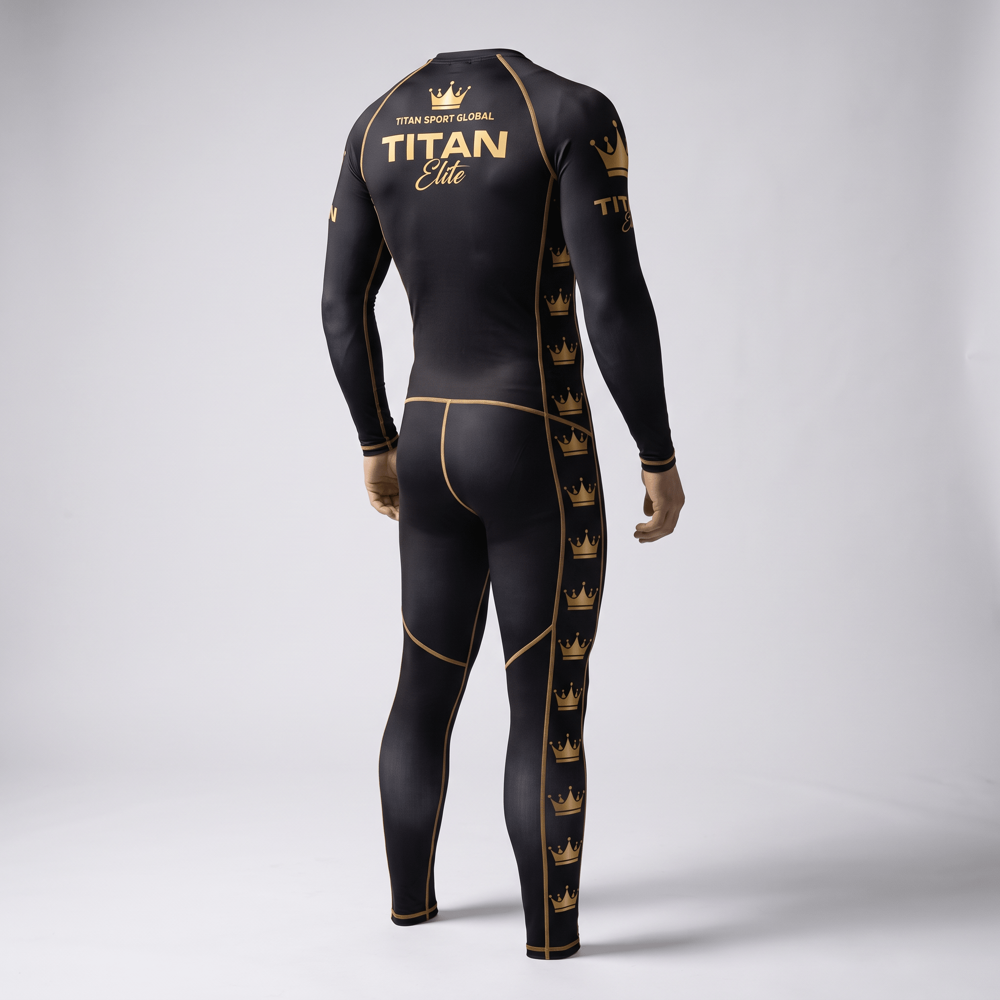 Back view of a black and gold Titan Elite full-body compression suit with crown logo graphics.