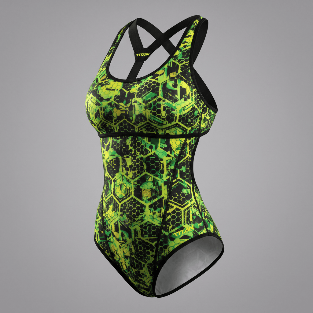 Green and black one-piece swimsuit featuring a geometric honeycomb and digital camo pattern with a racerback.