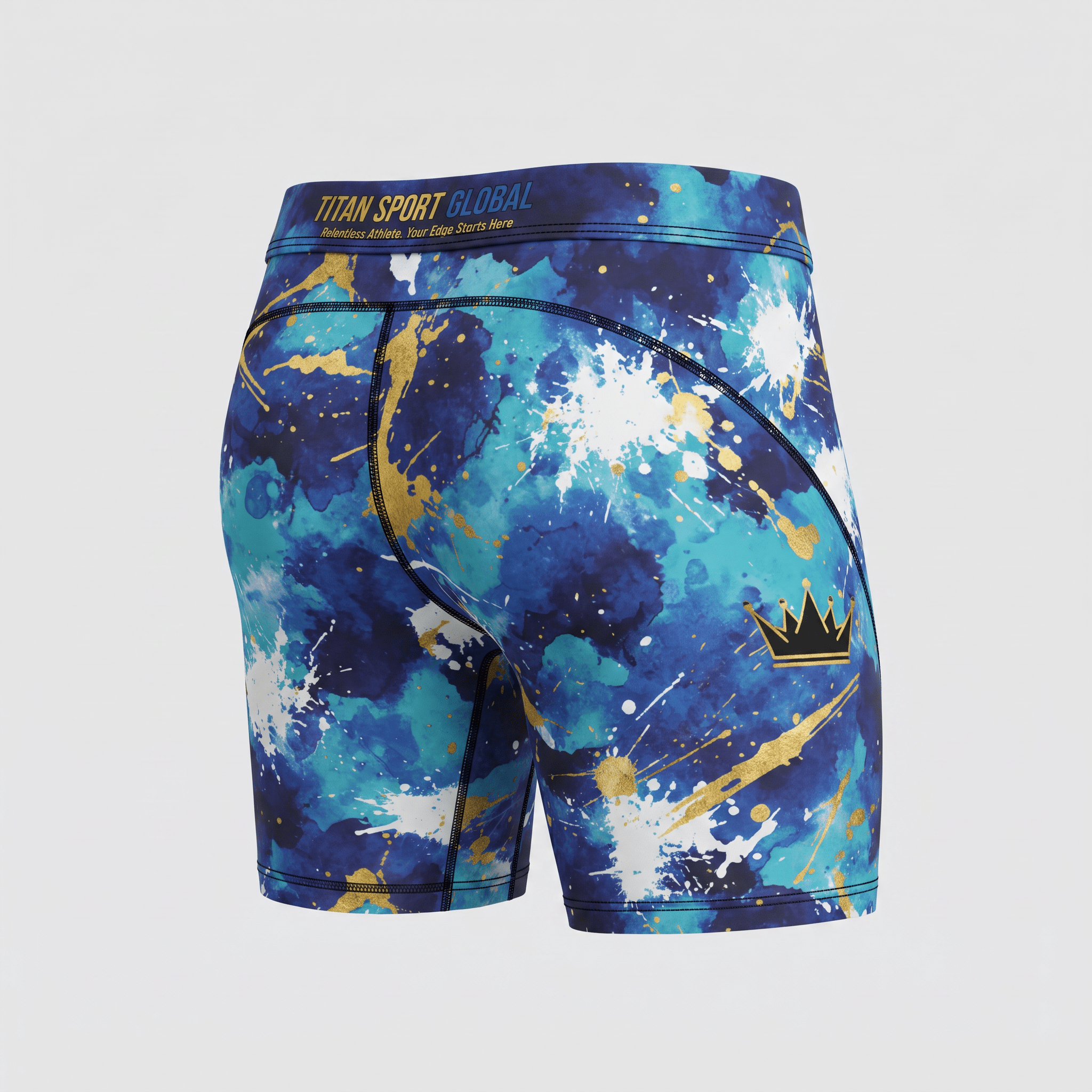 Rear view of blue, teal, and gold paint splatter compression shorts with branded waistband and crown logo.
