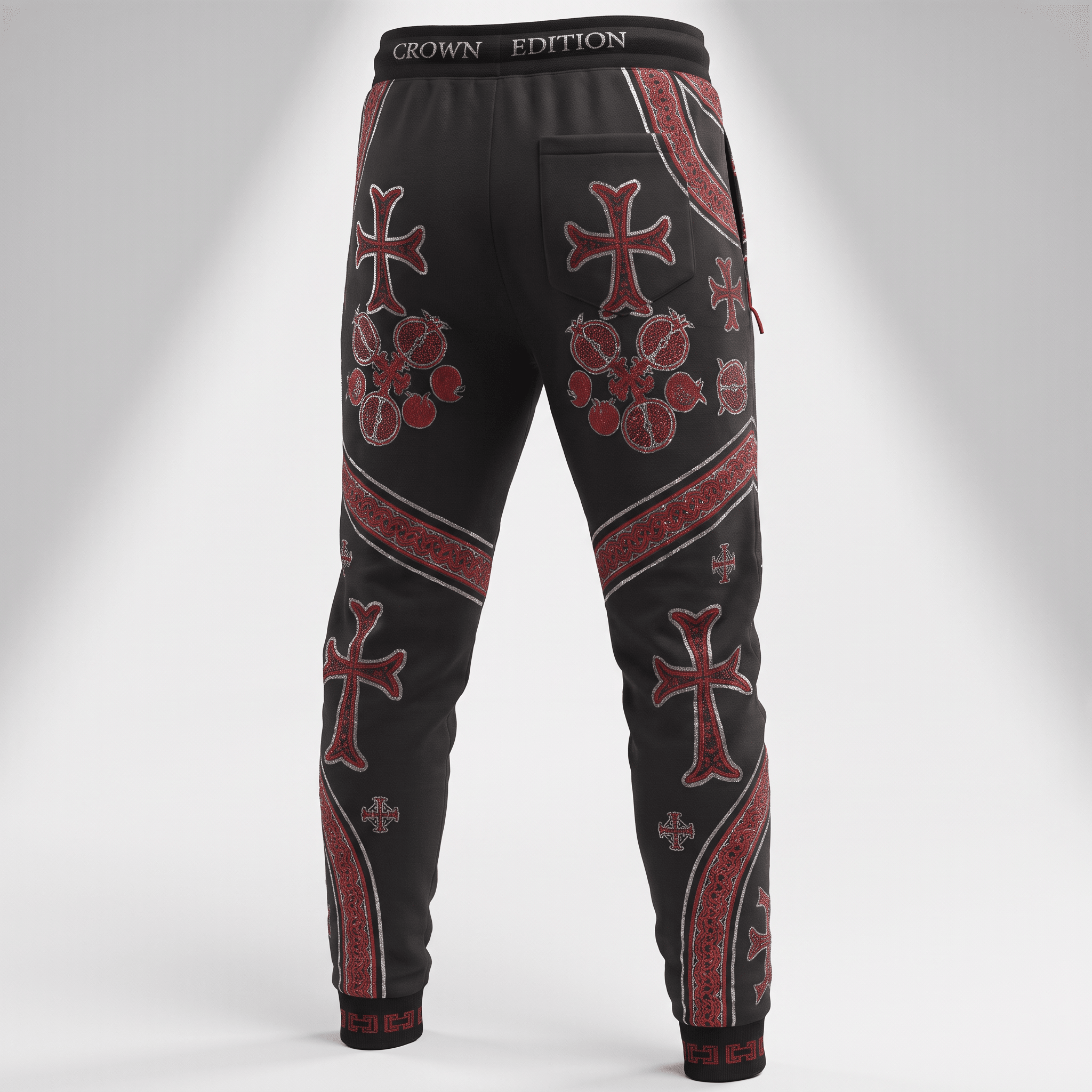 Back view of black Crown Edition sweatpants with red cross and floral graphic prints.