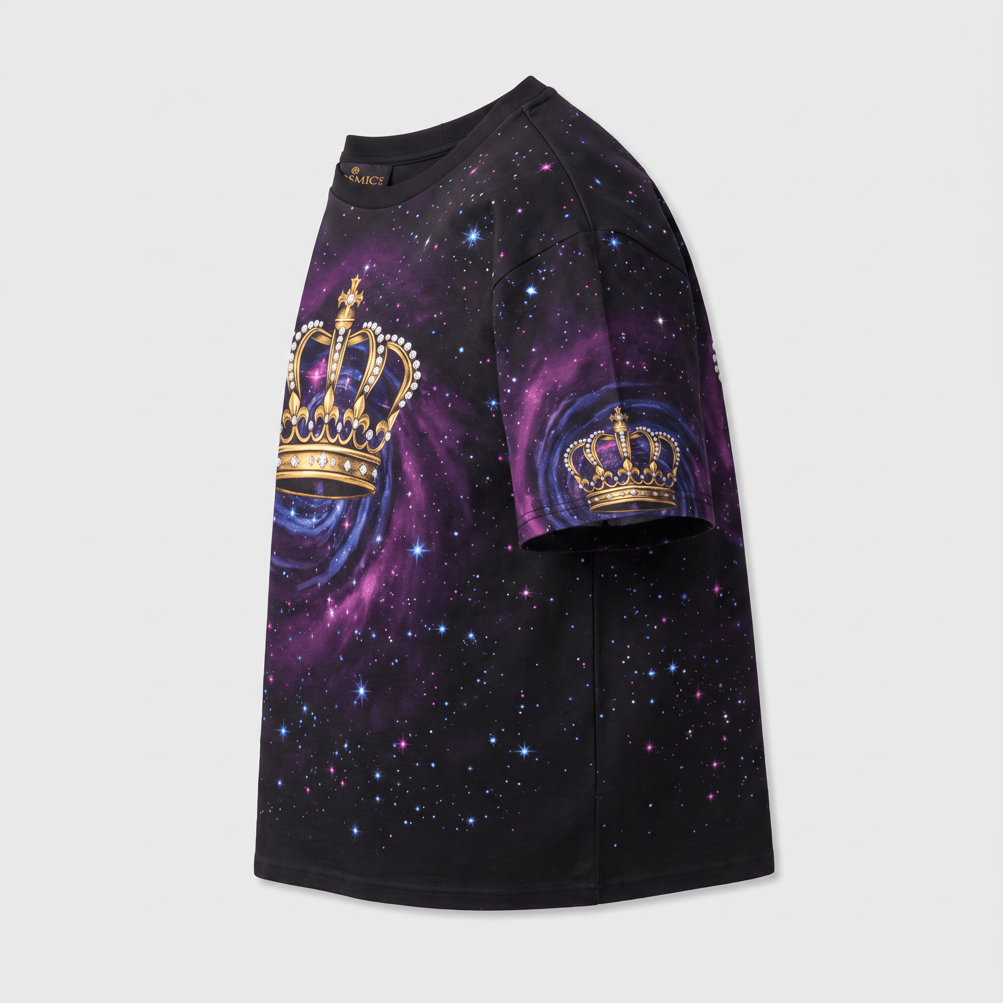 Black t-shirt featuring a purple galaxy print, starry night sky, and gold jeweled crowns on the chest and sleeve.