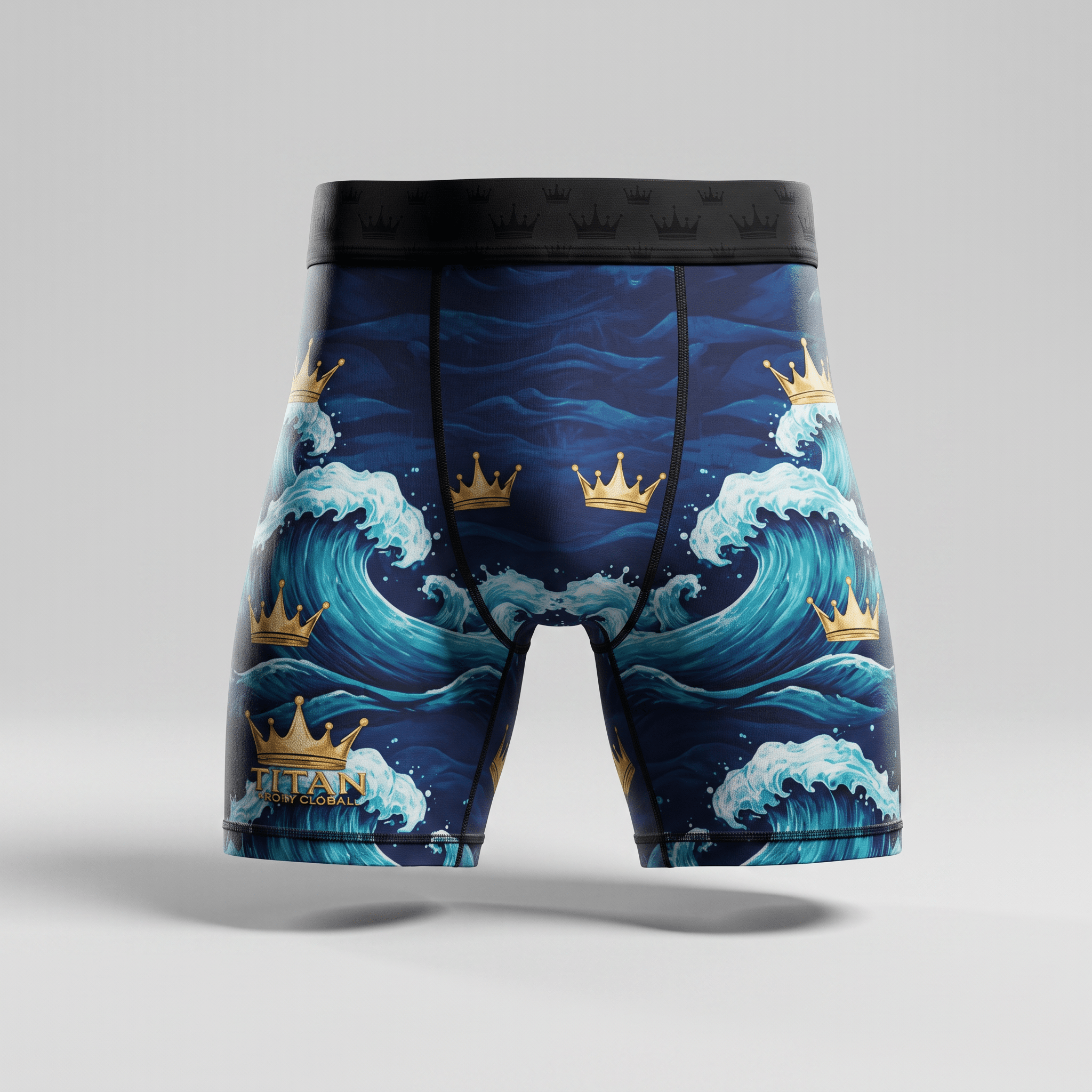 Blue boxer briefs featuring a gold crown and ocean wave pattern with a black waistband.