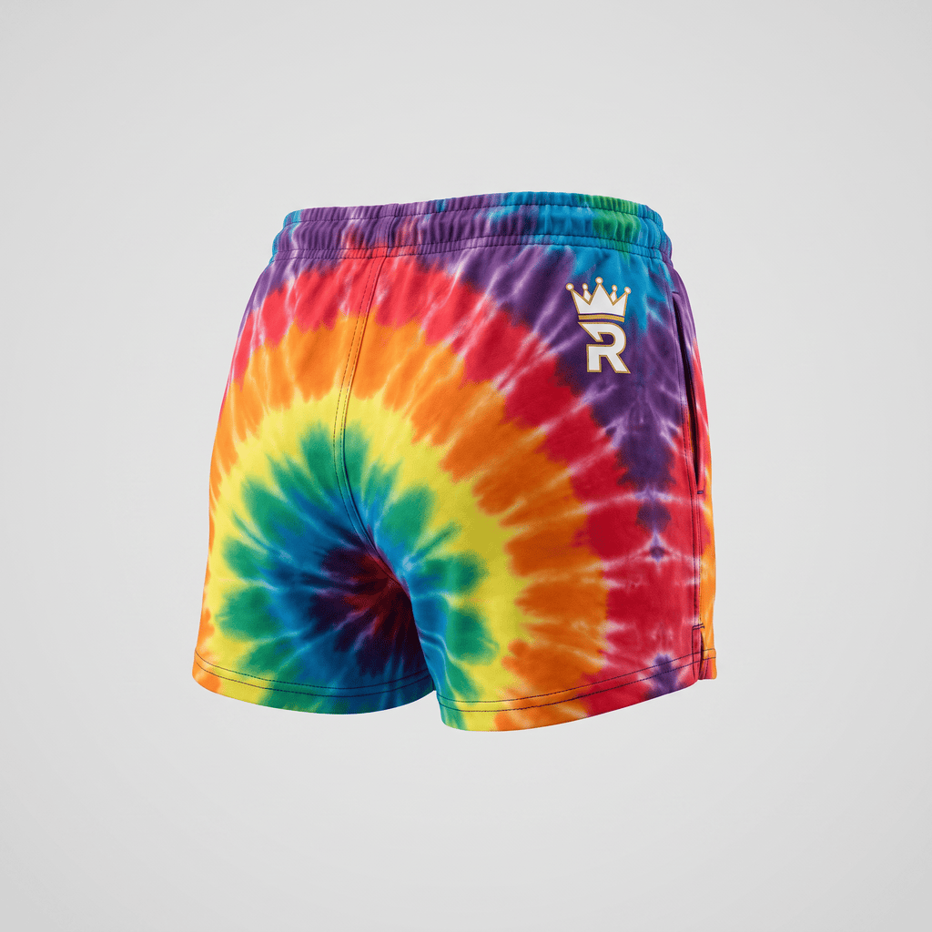 Back view of rainbow tie-dye athletic shorts with a white crown logo on the right hip.
