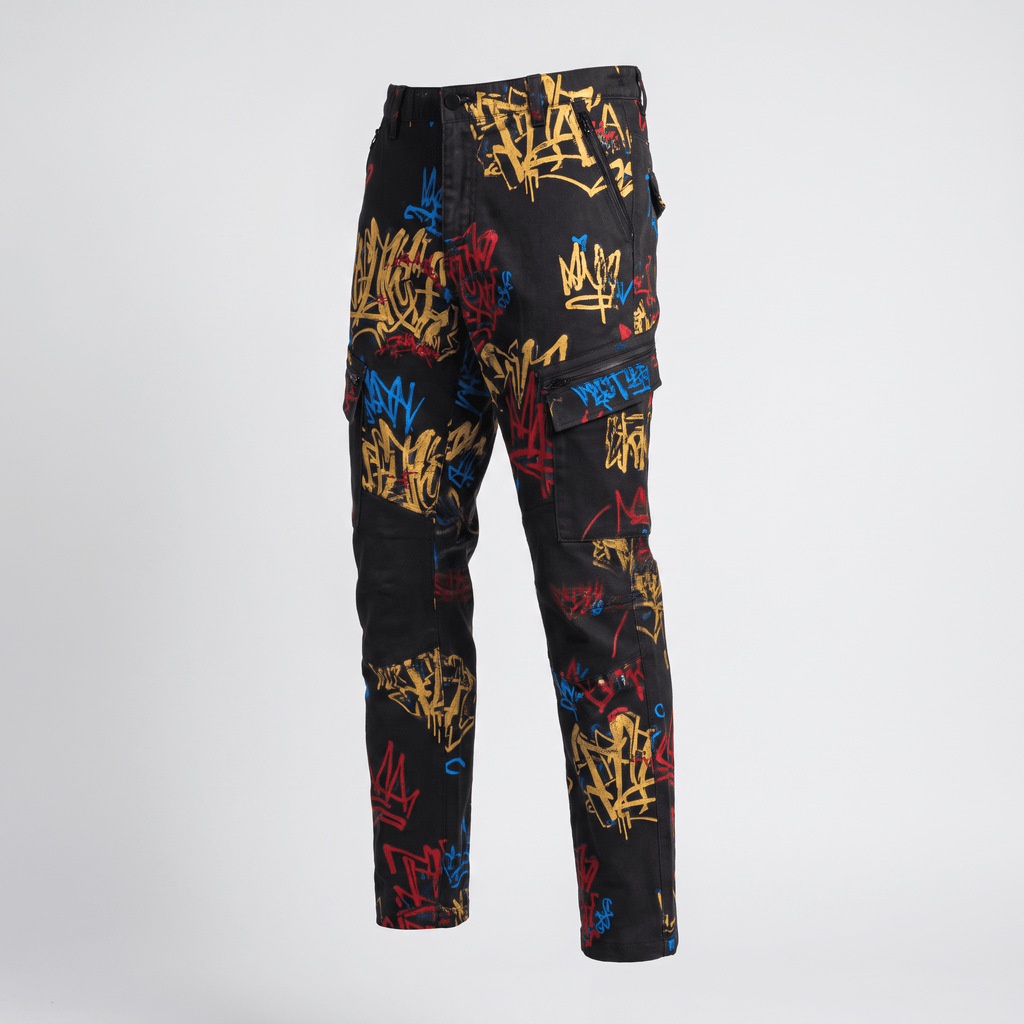 Black cargo pants with colorful graffiti print in yellow, blue, and red against a plain background.
