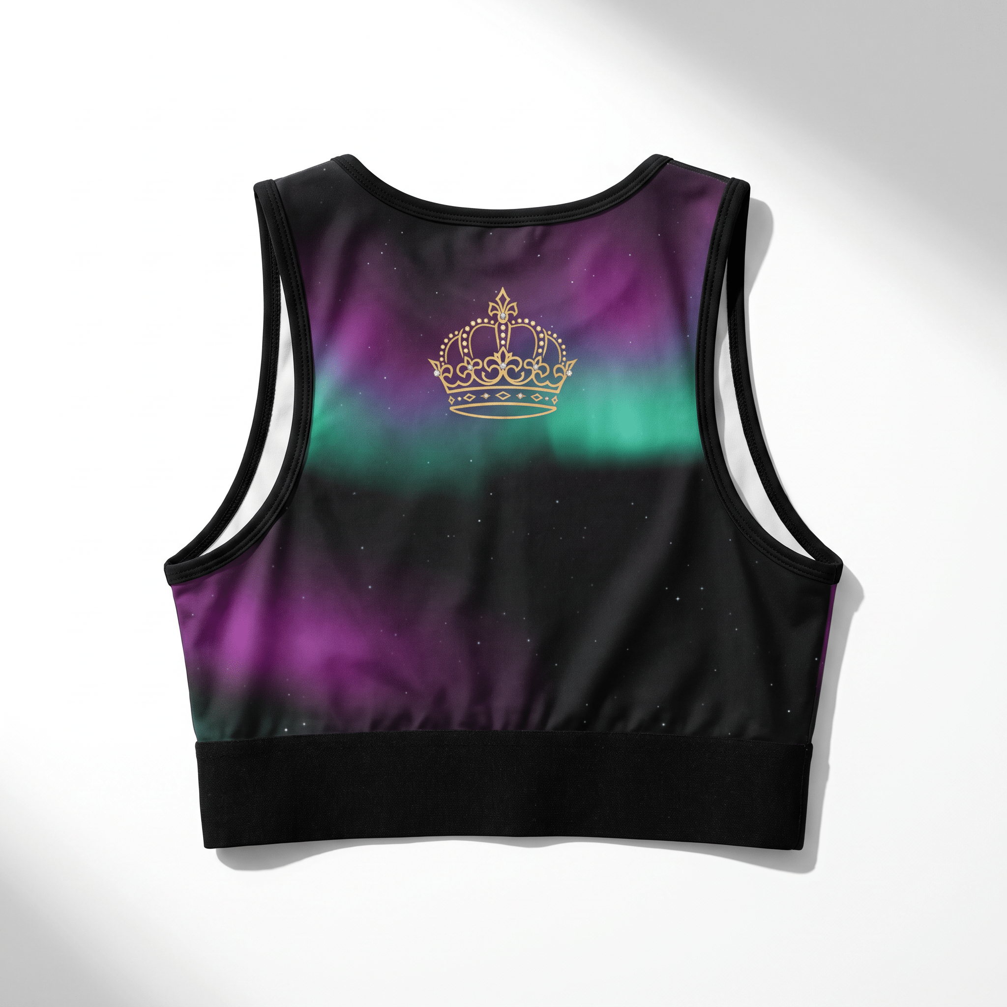 Back view of a black, purple, and green sports bra featuring a gold crown graphic.