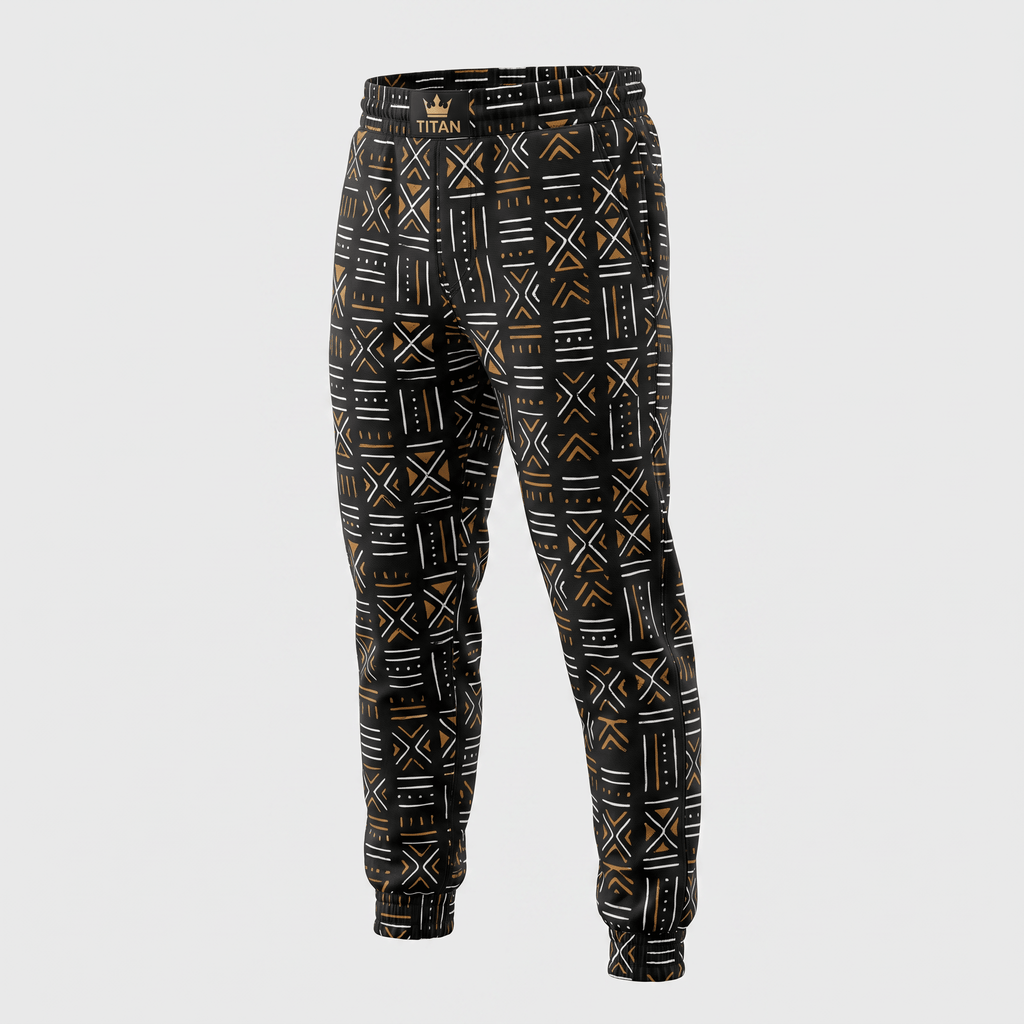 Black and gold jogger sweatpants featuring a geometric tribal mudcloth pattern and elastic waistband.