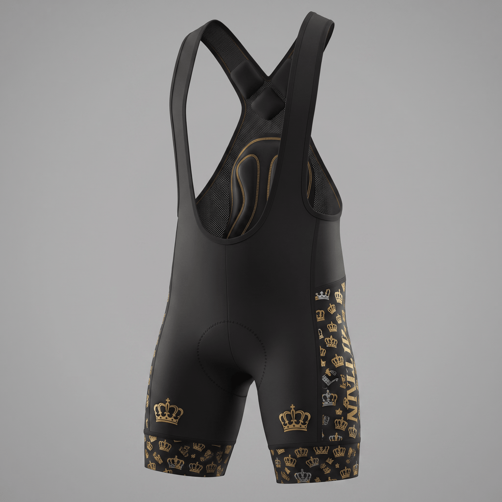 Black cycling bib shorts with gold crown pattern and suspender straps.