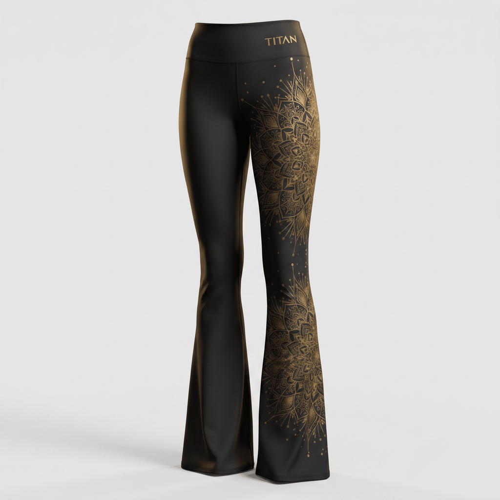 Black flare yoga pants with metallic gold mandala print on the left leg and Titan logo on the waistband.