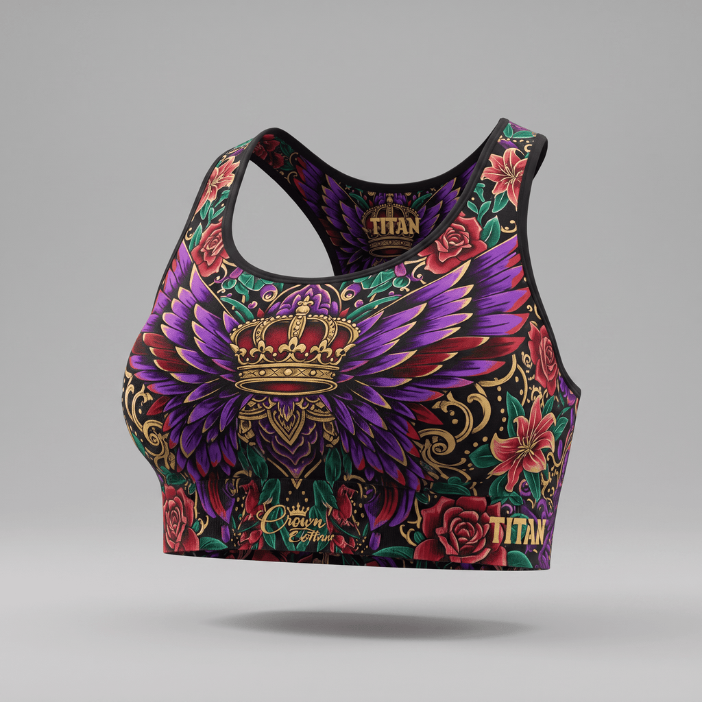 Black sports bra featuring a colorful crown, purple wings, and red floral tattoo art print.