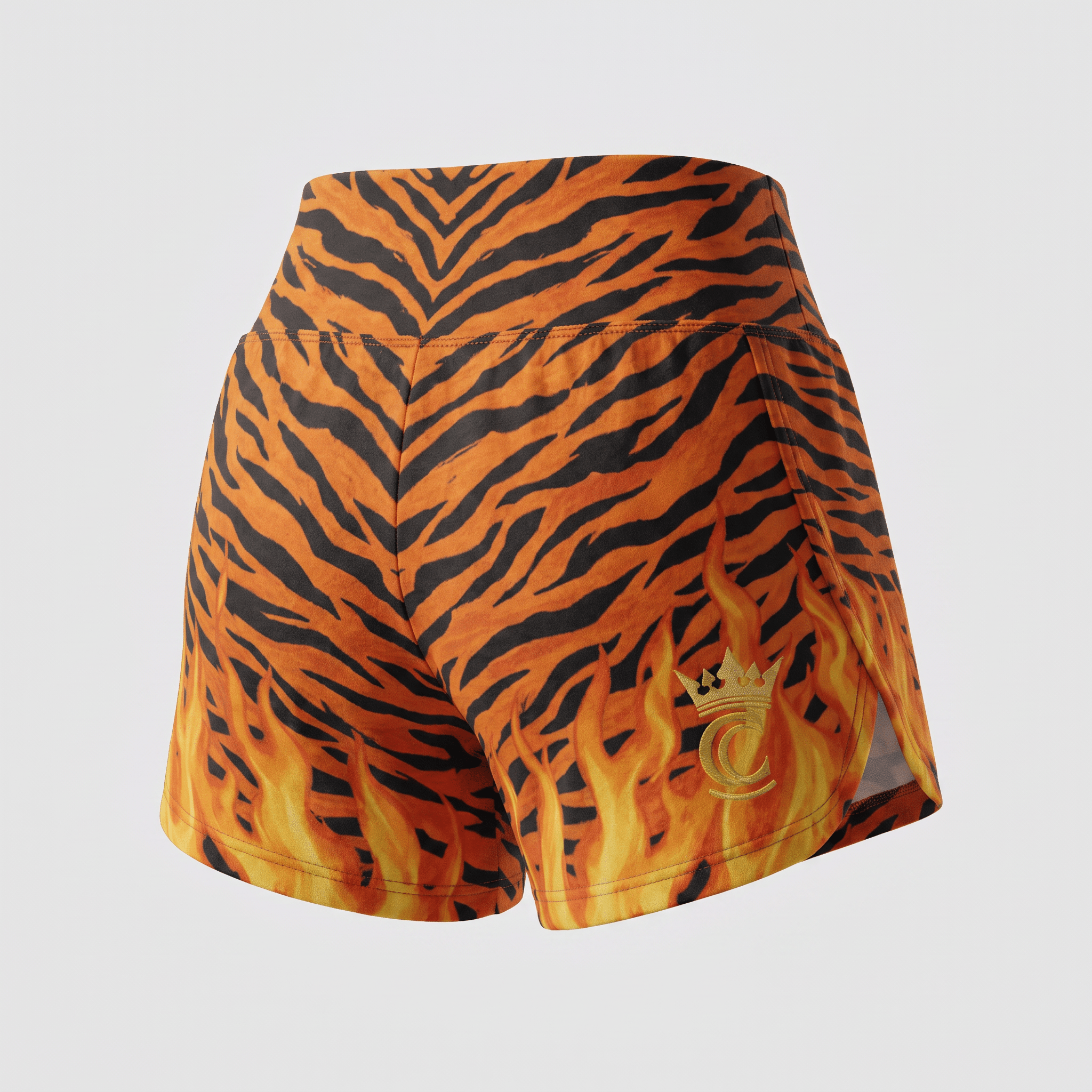 Back view of athletic shorts featuring an orange and black tiger stripe pattern with yellow flames and a gold crown logo.