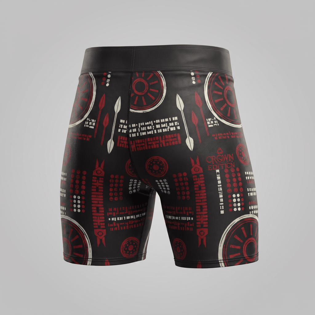 Black and red athletic boxer briefs with tribal shield, spear, and geometric print, back view.