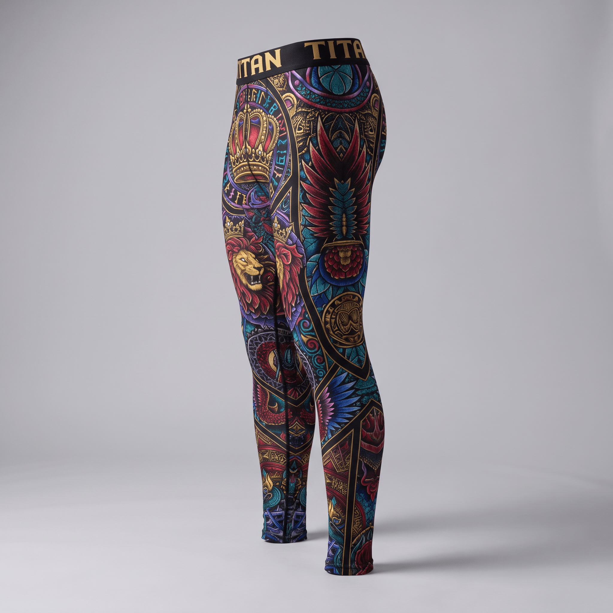 Colorful athletic leggings with intricate stained glass print featuring a lion, crown, and black branded waistband.