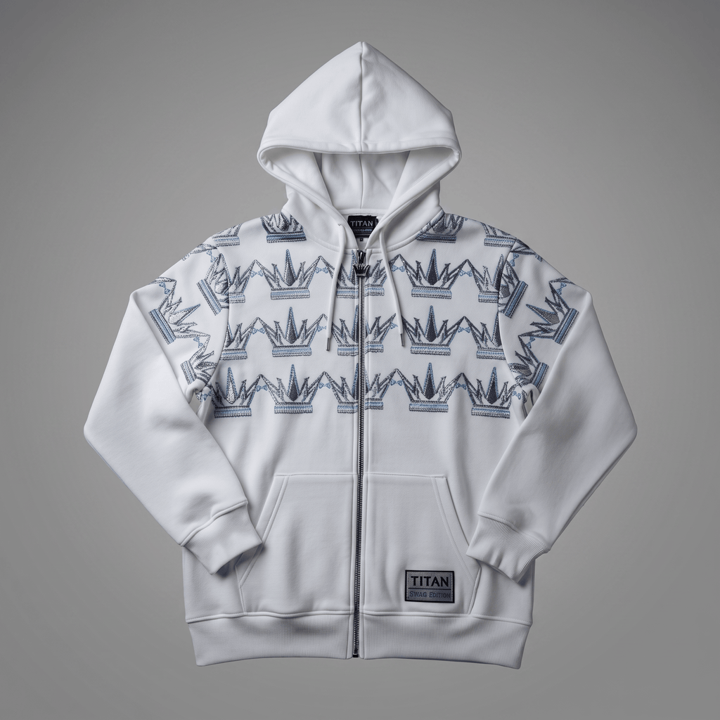 White zip-up hoodie featuring a blue crown pattern across the chest and shoulders, with a Titan Swag Edition patch.