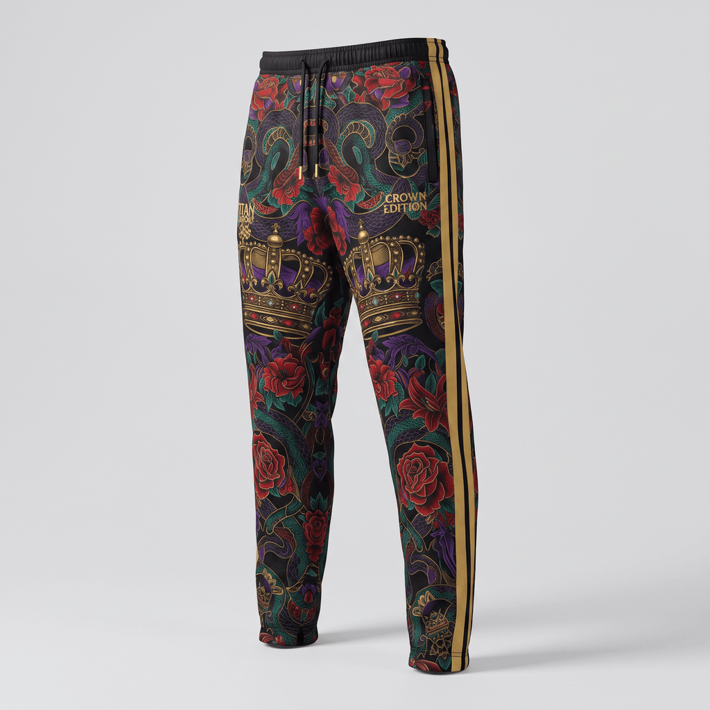 Black joggers featuring a colorful floral, snake, and crown print with gold side stripes.