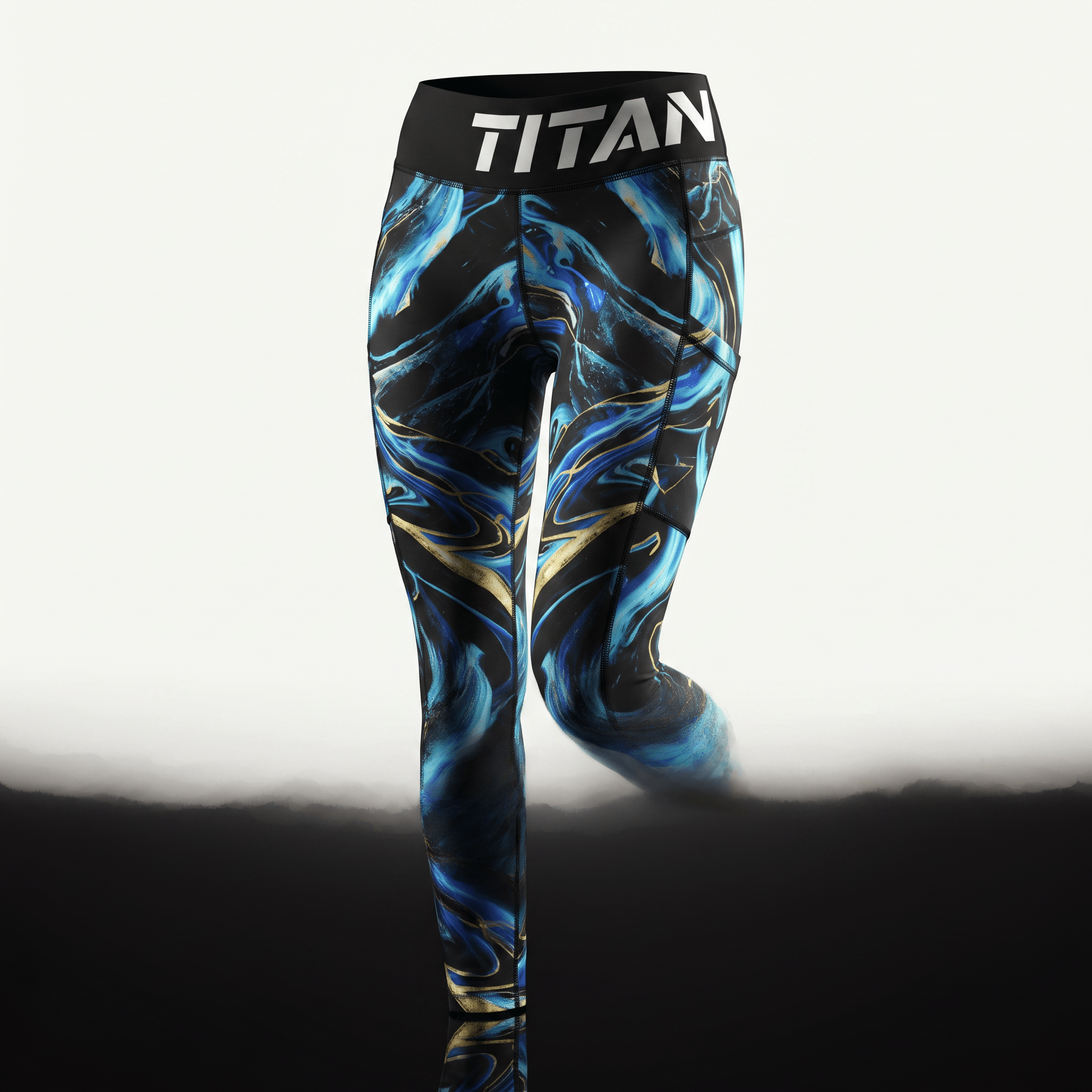 Titan black and blue marble athletic leggings with a wide branded waistband.