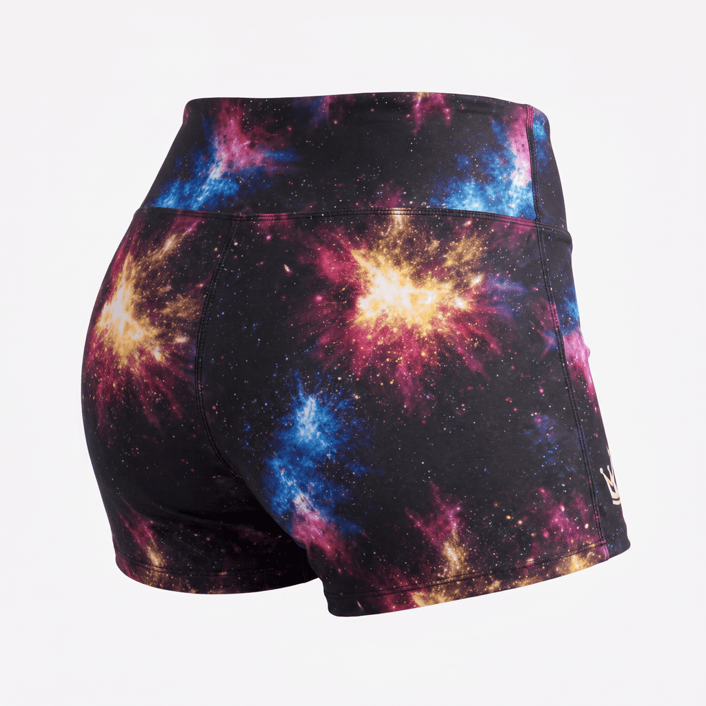 Rear view of athletic shorts featuring a vibrant galaxy print in black, blue, pink, and yellow.