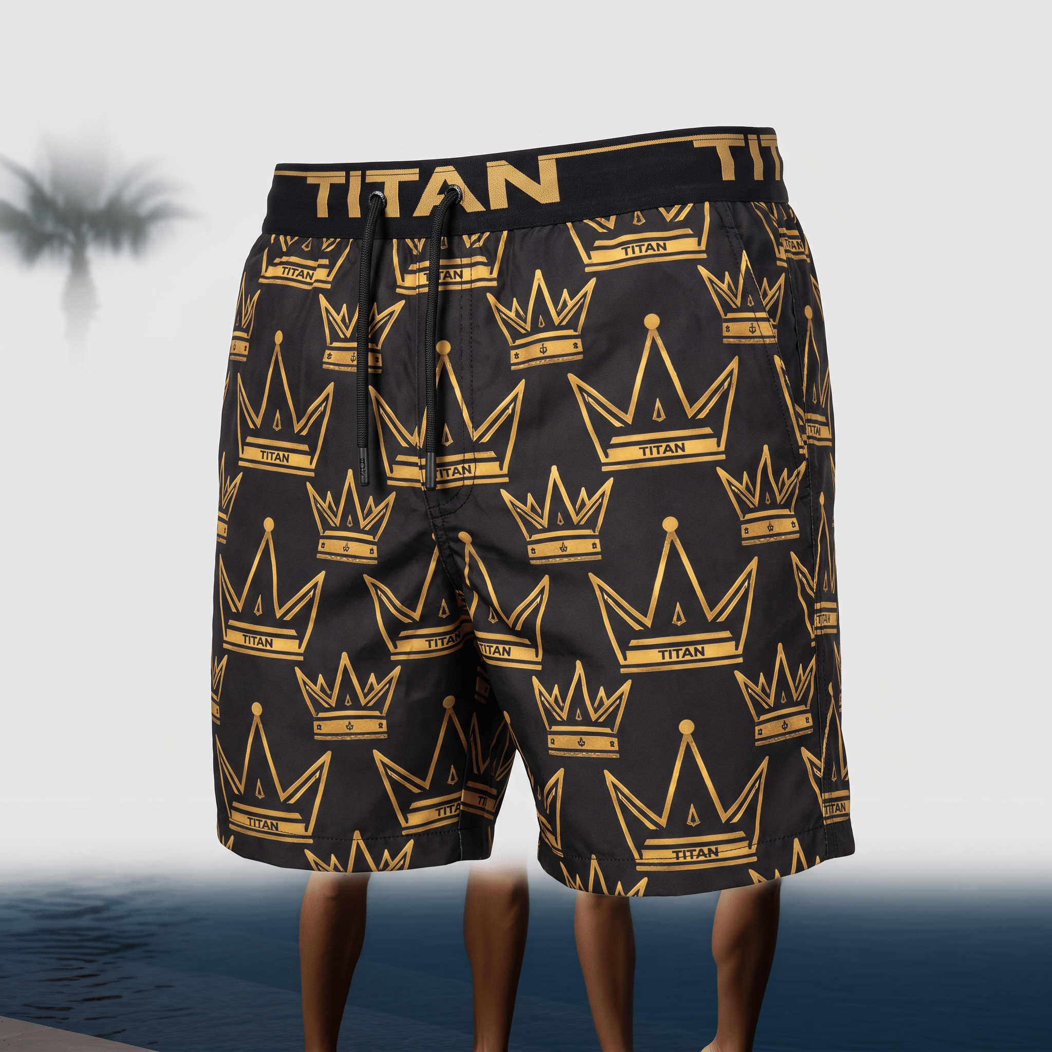 Black swim trunks with an allover gold crown and Titan logo pattern, black drawstring waist, and palm tree background.