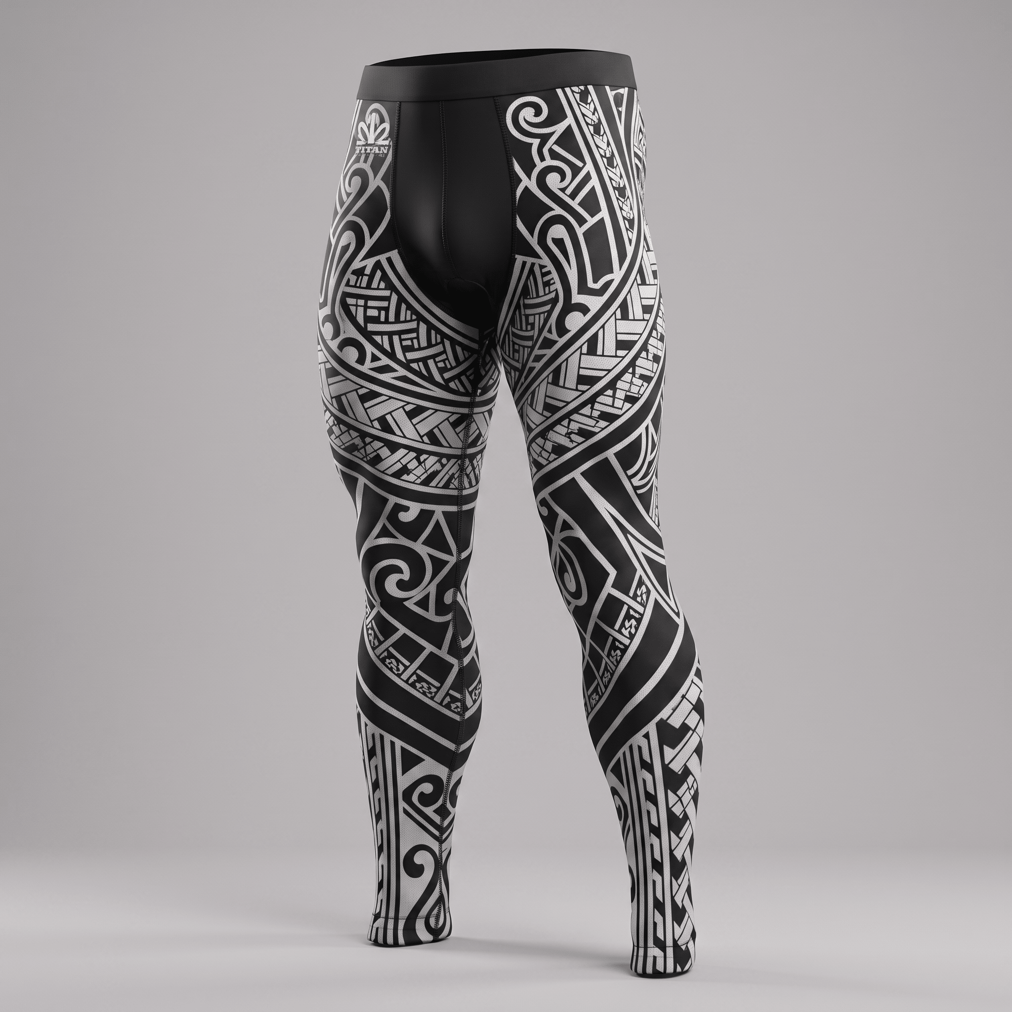 Black and white athletic compression leggings with intricate Polynesian tattoo patterns on a neutral background.