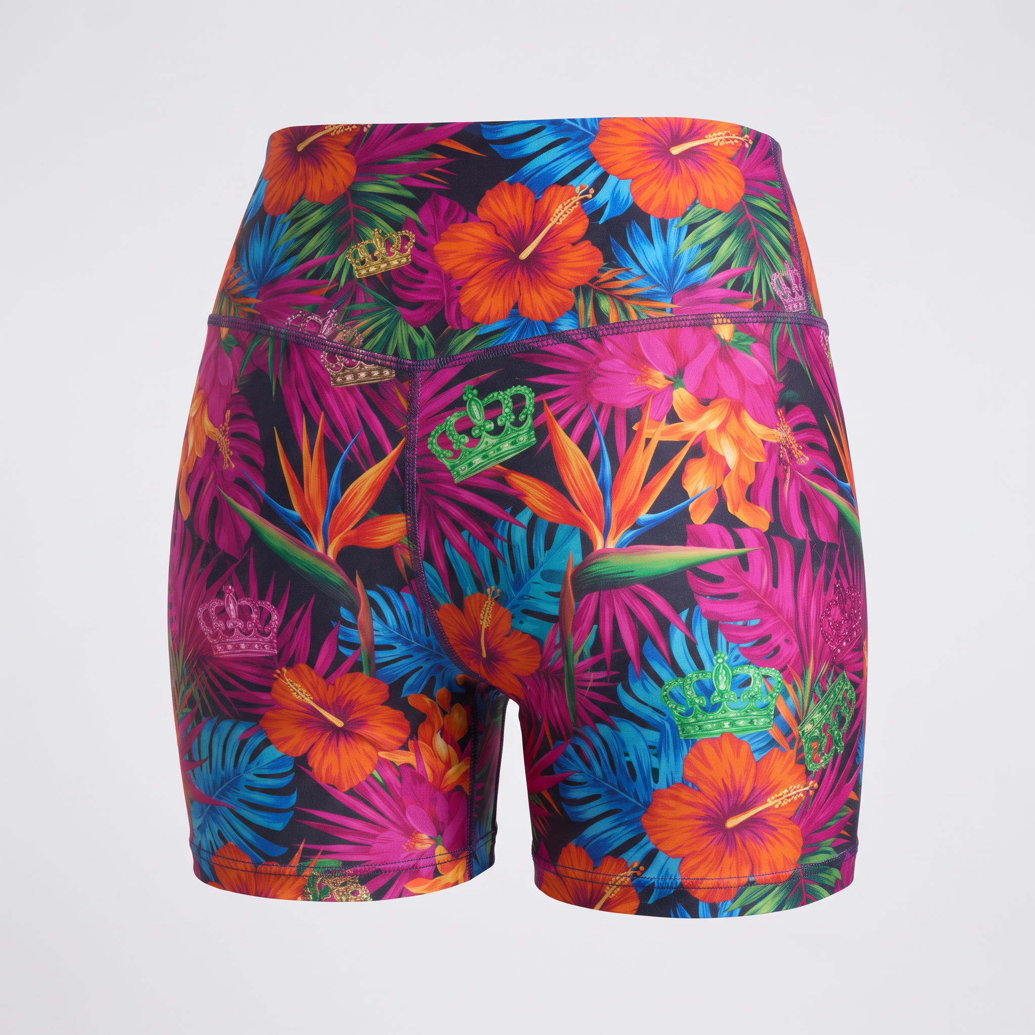 High-waisted athletic shorts featuring a vibrant tropical floral print with hibiscus and crowns on a dark background.
