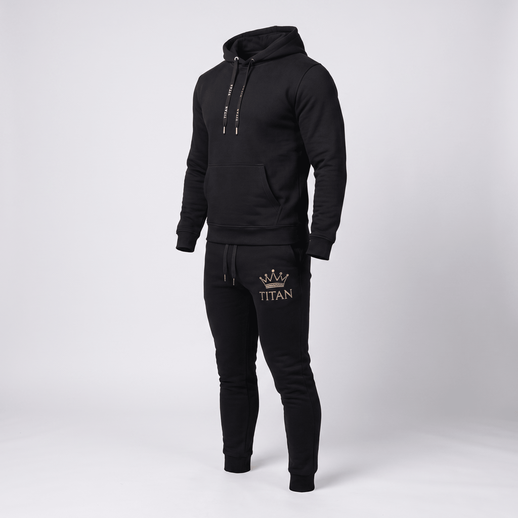 Black athletic tracksuit featuring a hoodie and joggers with gold Titan crown logo.