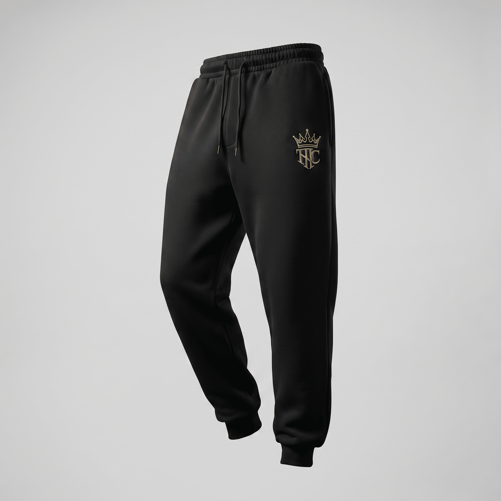 Black fleece sweatpants with a gold THC crown logo on the left thigh and an adjustable drawstring waist.