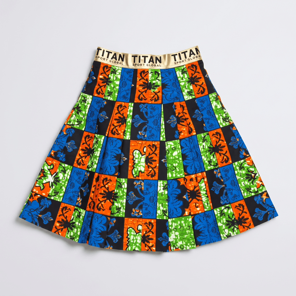 Pleated knee-length skirt featuring vibrant colorful African print patterns and a metallic gold branded waistband.