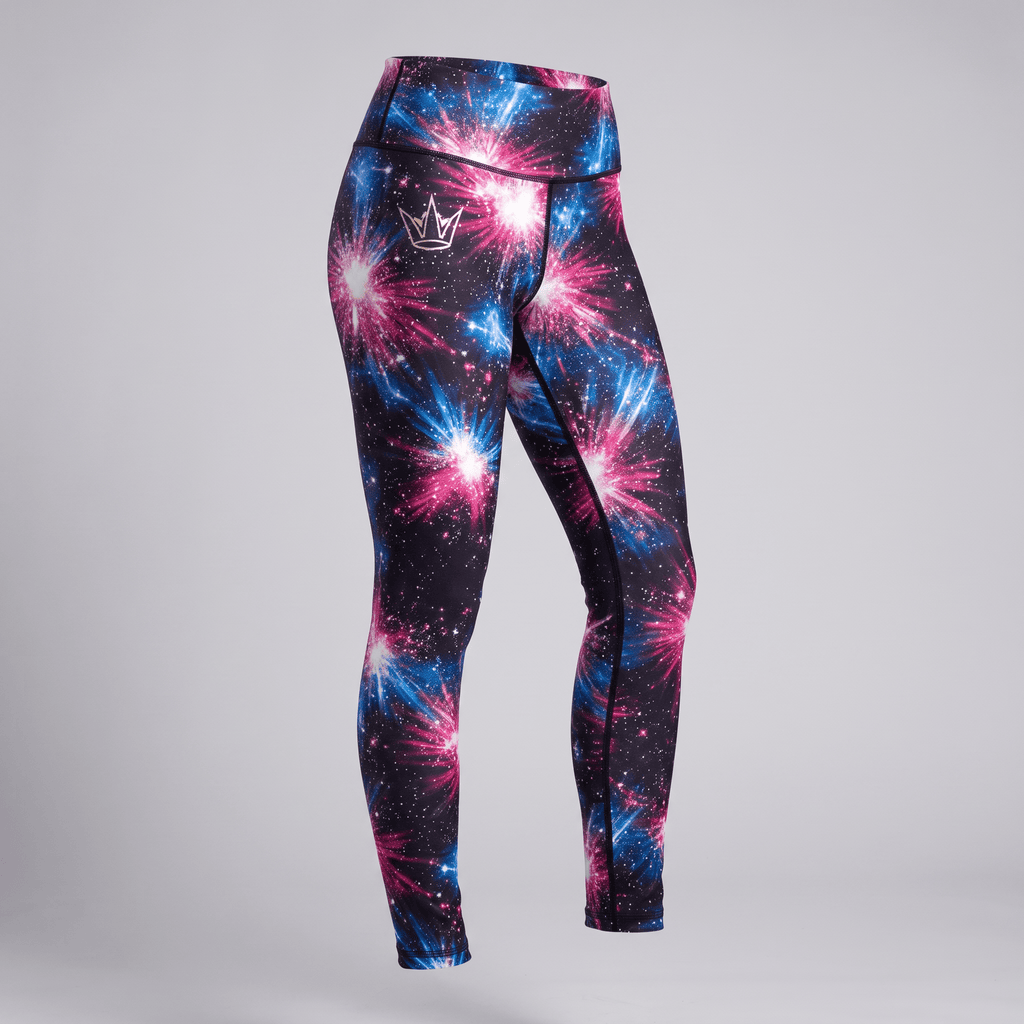 High-waisted athletic leggings in black with vibrant pink and blue starburst nebula print and silver crown logo.