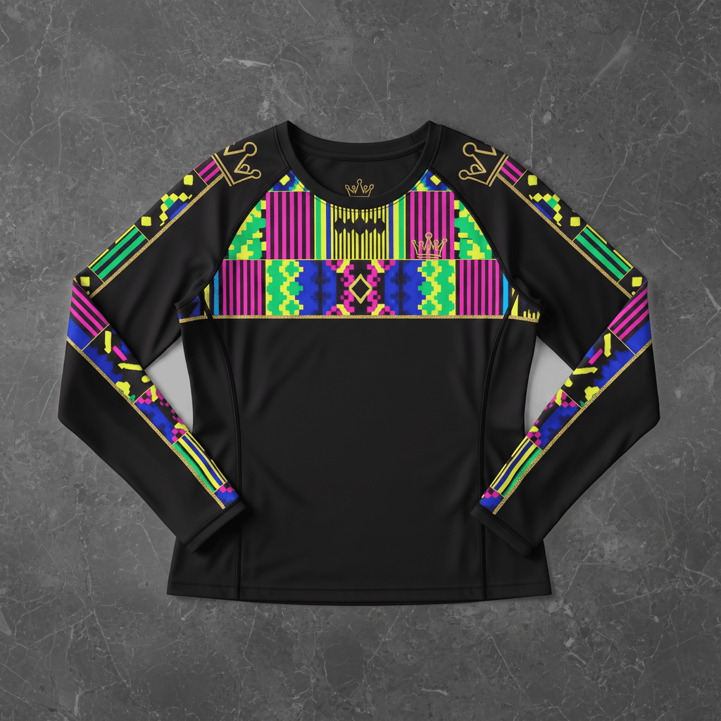Black long-sleeve rash guard featuring vibrant neon kente print panels and gold crown details on shoulders.