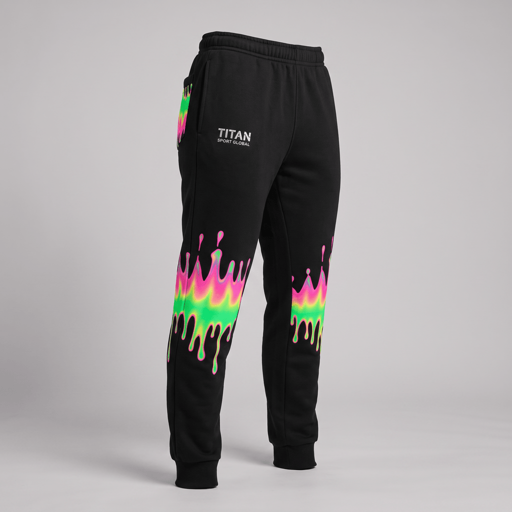 Black sweatpants with neon pink and green drip graphics, cuffed ankles, and Titan Sport Global logo.