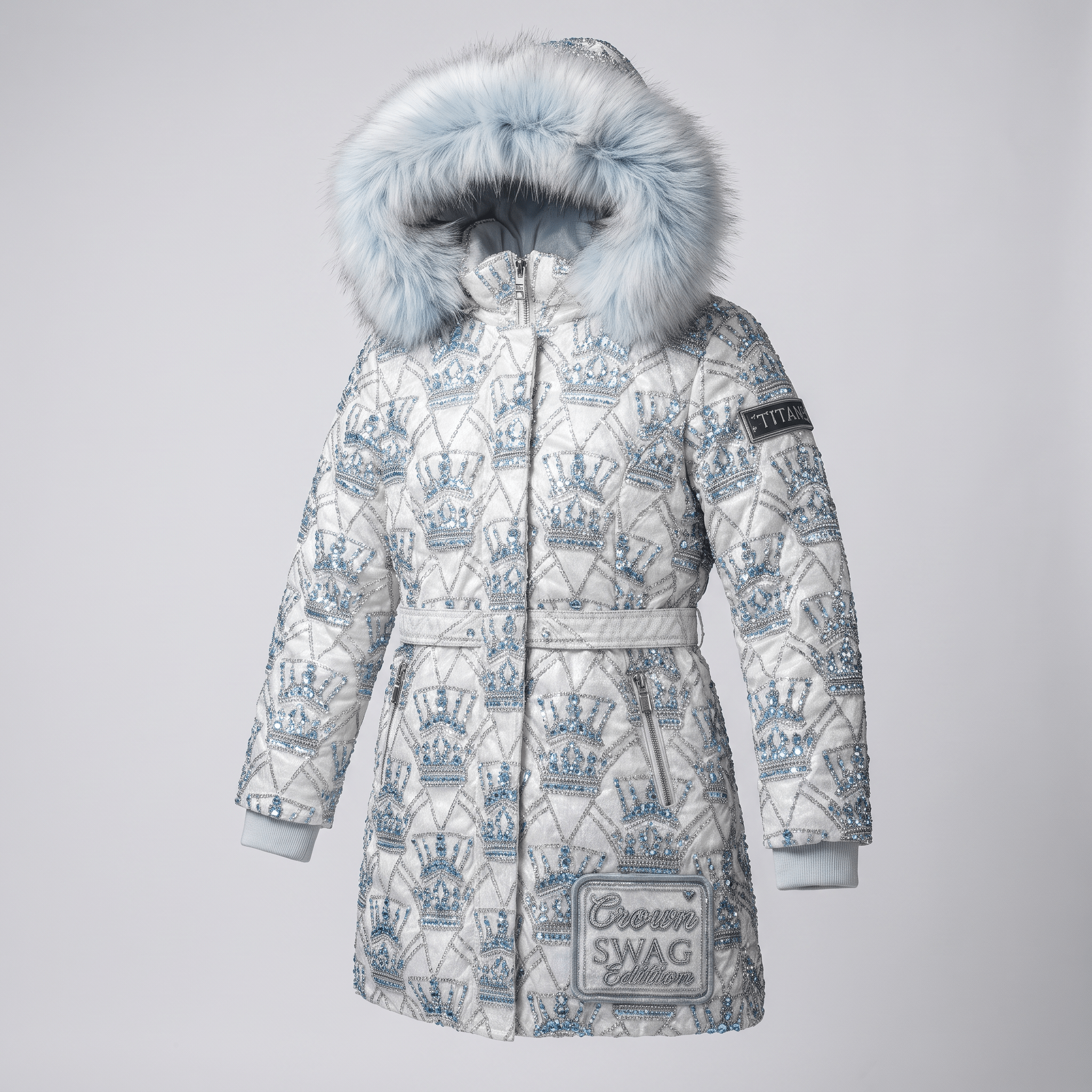 White winter puffer jacket with blue rhinestone crown pattern, faux fur hood, and matching belt.