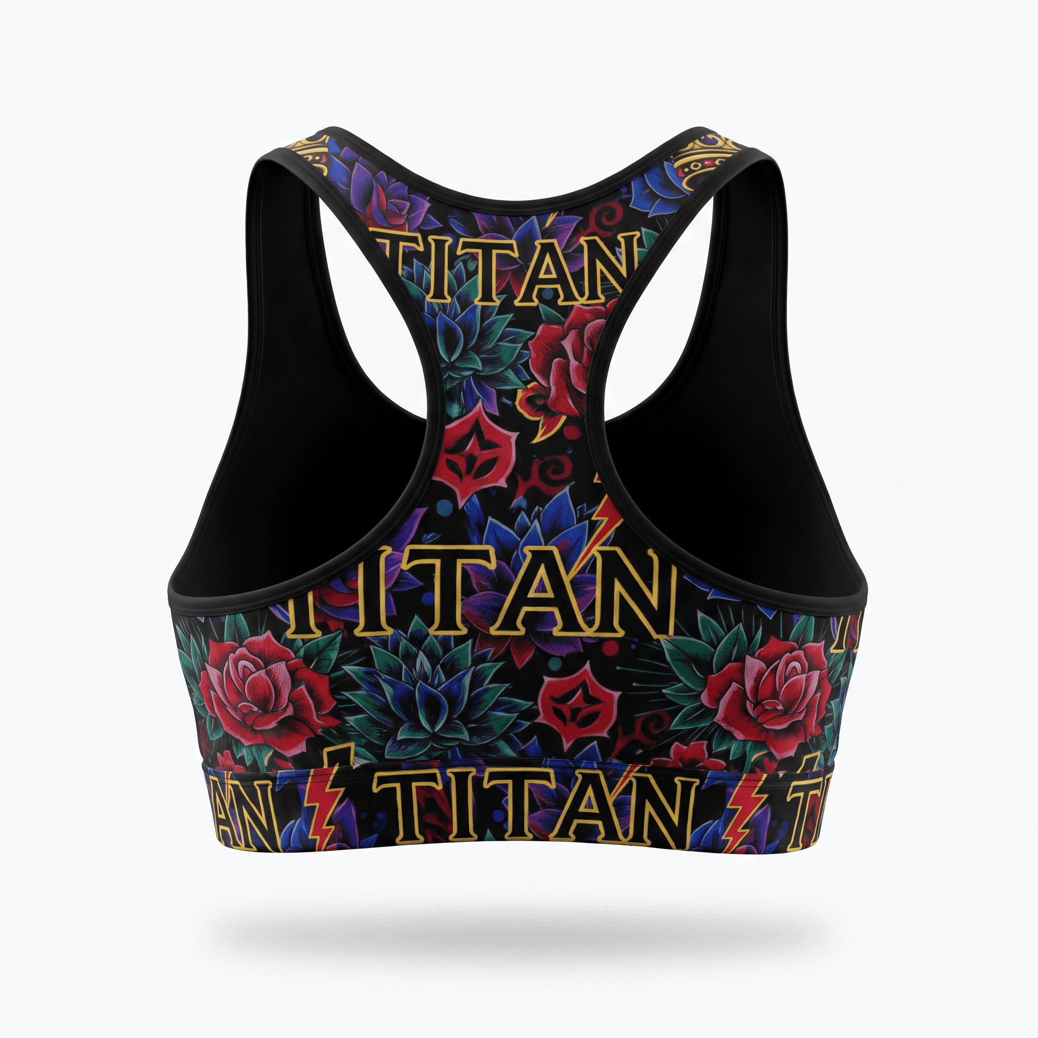 Back view of a black racerback sports bra featuring a tattoo print with red roses, blue flowers, and gold Titan text.