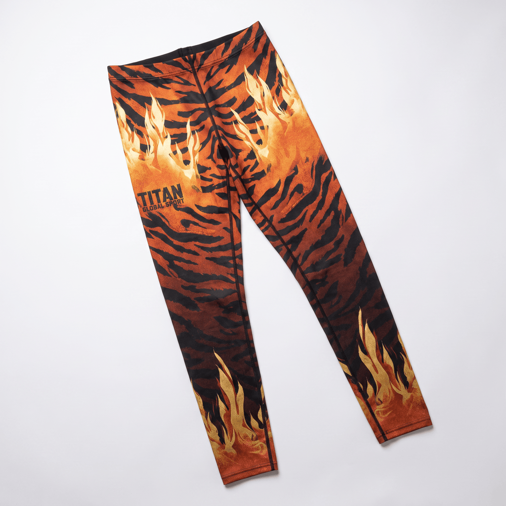 Titan Global Sport athletic leggings with orange and black tiger stripe and flame print.