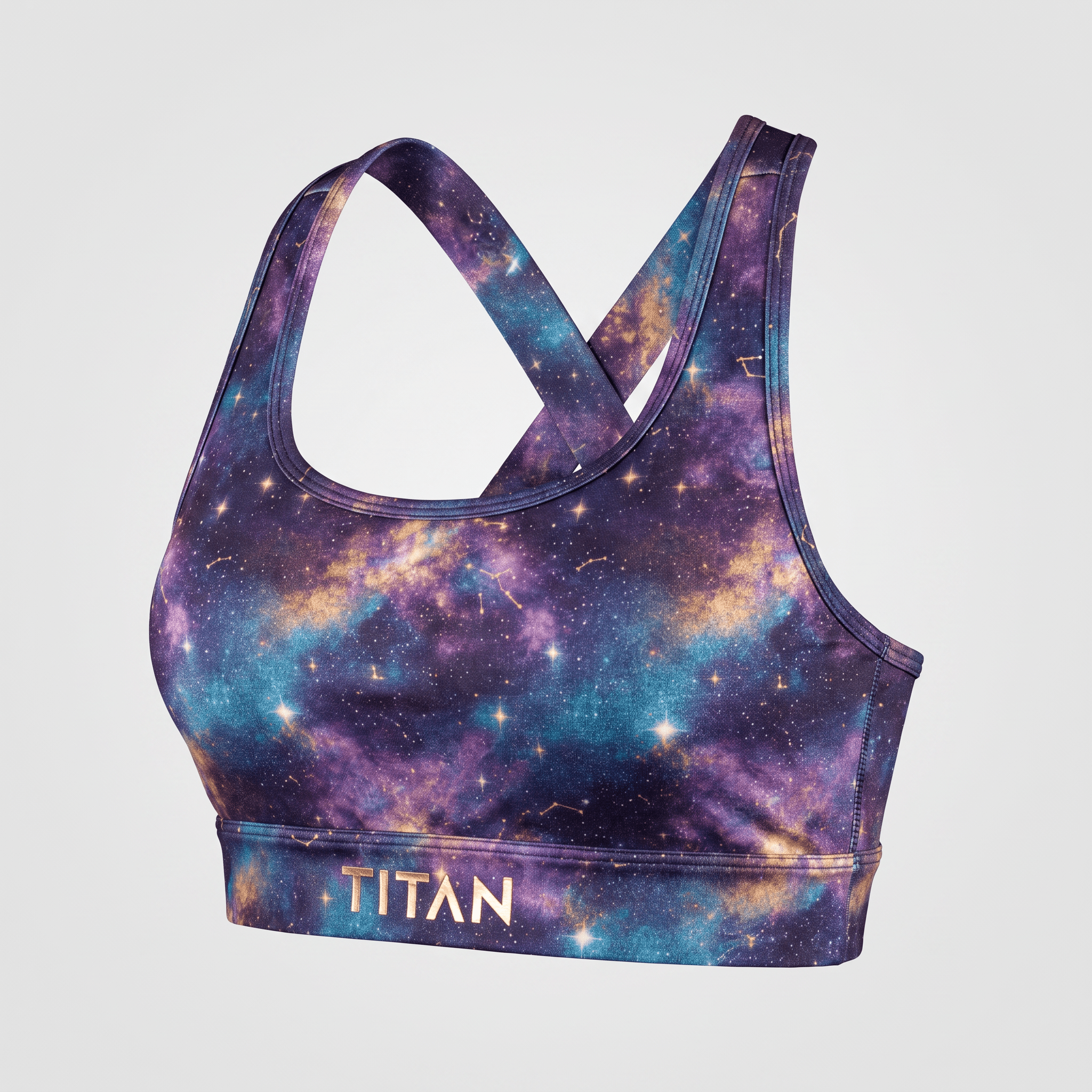 Titan sports bra in purple and blue galaxy space print with crisscross straps.