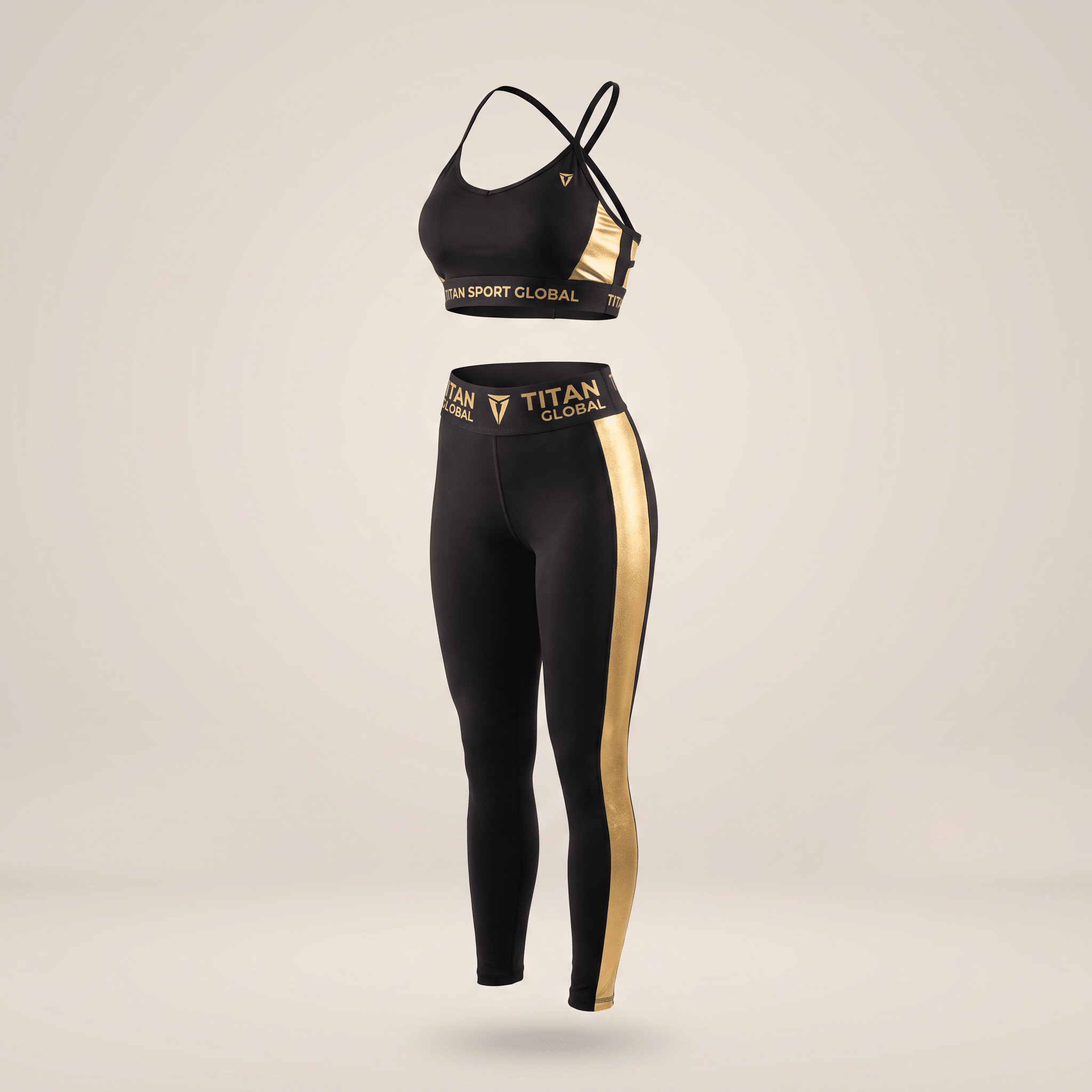Black athletic sports bra and matching high-waisted leggings set with metallic gold side stripes and Titan Global branding.