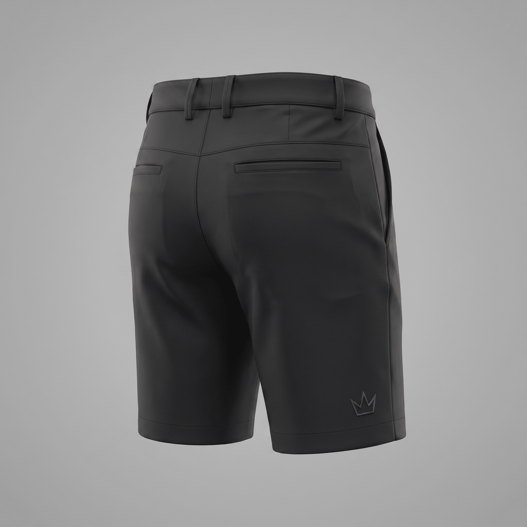 Back view of black performance golf shorts with belt loops and subtle crown logo on the hem.