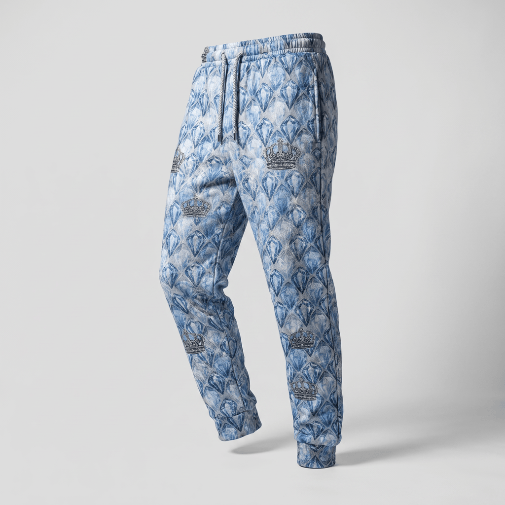 Blue fleece sweatpants featuring an allover diamond pattern and crown graphics, with an elastic drawstring waist.